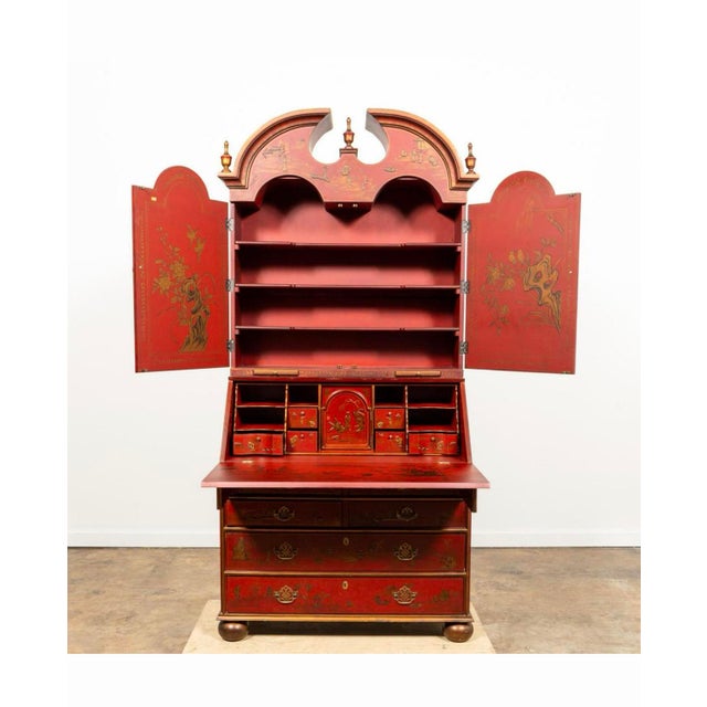 A striking George-I style chinoiserie secretary bookcase, beautifully finished in a vibrant scarlet red japanned lacquer...