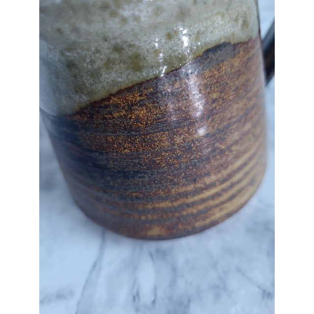 Beautiful studio art handmade and glazed pottery mug. Perfect as a gift or collection piece.