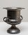A 20th Century French silver-plated champagne bucket distinguished by its tall, urn-like silhouette and richly detailed...