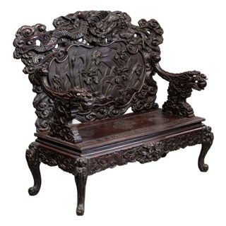 Early 20th Century Heavily Carved Antique Japanese Dragon & Iris Settee For Sale