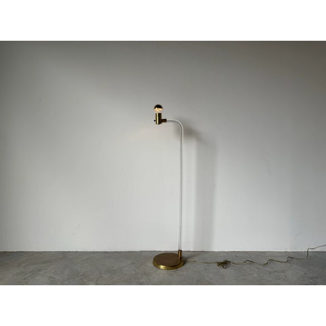 Offered is a Vintage 1970's Crylicord brass and Lucite reading lamp, designed by Peter Hamburger for Knoll, 1970's. This...