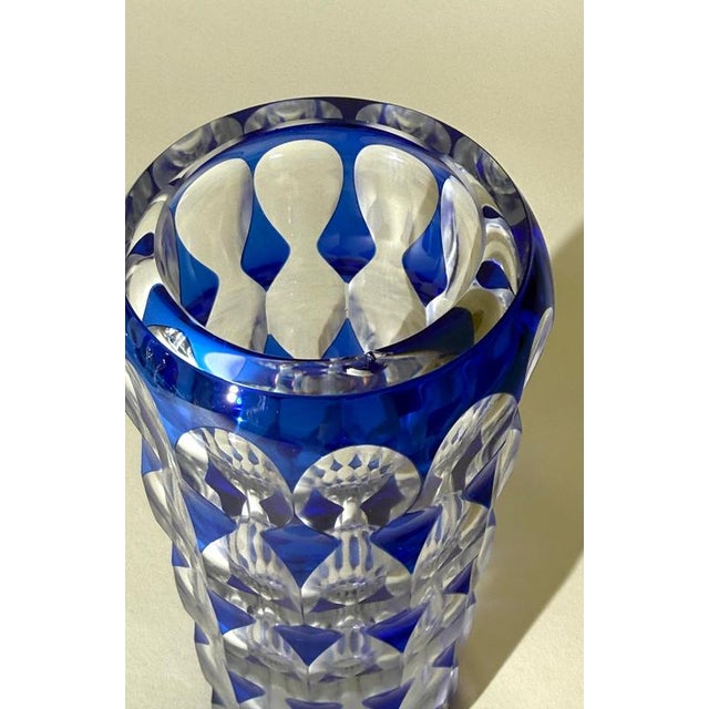An exceptional Bohemian cut crystal vase manufactured by Carl Meltzer & Co. in Langenau near Haida, circa 1915–1916. The...