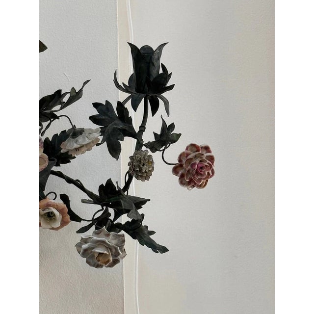 Pair of outstanding 19th Century French tole sconces, previously owned by Iris Apfel having fine porcelain flowers, each...