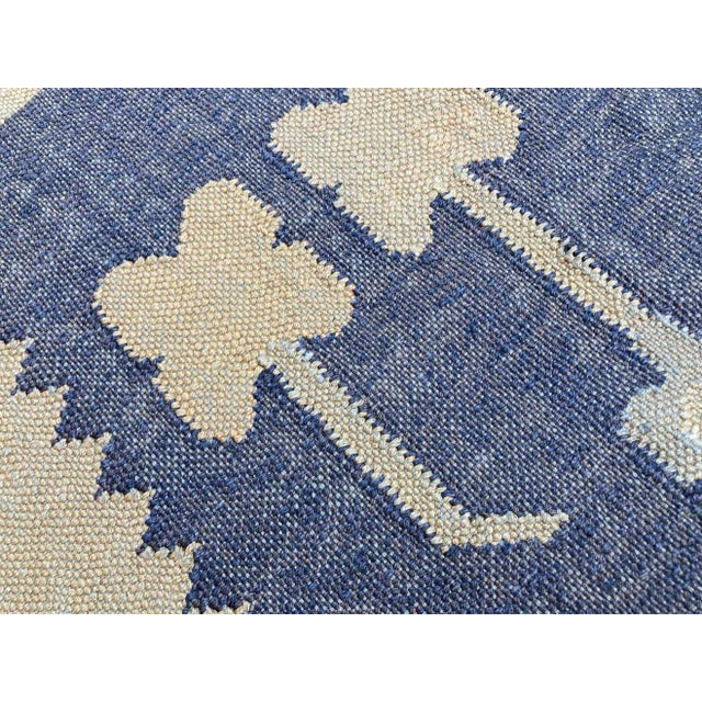 Vintage small ethnic rug. Handcrafted South Asian tribal rug hand-woven with floral and geometric designs. This rug is...