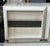 This is a pair of vintage Desirèe bedside tables designed by Luciano Frigerio for Frigerio di Desio in the 1970s....