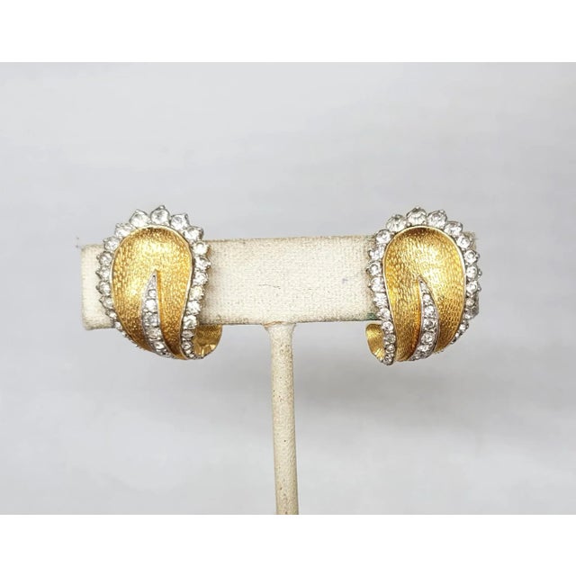 Metal Vintage 1960s Signed Jomaz Goldtone & Clear Rhinestone Clip Earrings - 2 Pieces For Sale - Image 7 of 9