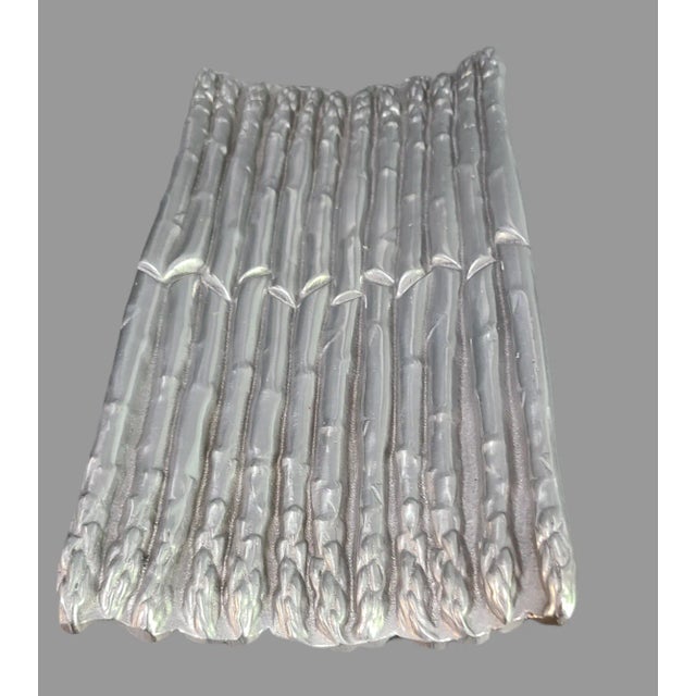 This vintage Wilton Pewter Armetale Metal tray is a unique addition to any collection. Crafted in the United States, this...