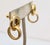 1980s goldtone smooth loop top with textured loop drop pierced push back earrings. Marked "GIVENCHY©" on the back of both...