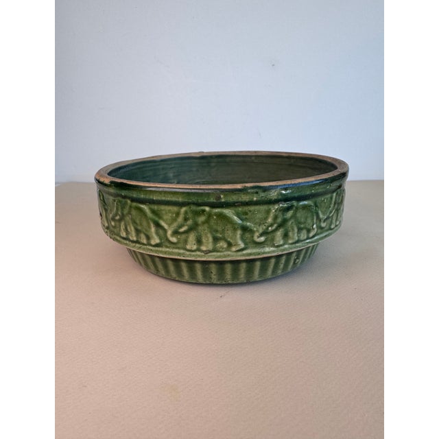 A most cheery piece with a parade of elephants around the dish. Made for forcing bulbs, this can be utilized as a dog...