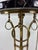 This is a pair of antique early 20th century marble topped pedestal tables. These incredible pedestals feature black...