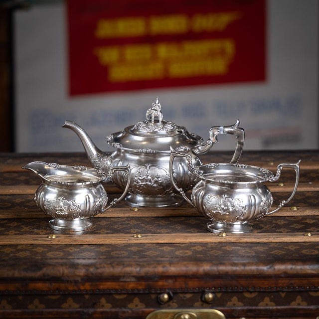 Antique 19th century indian three piece tea set, comprising a teapot, milk jug and sugar bowl. Each piece stands on a...