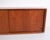 Danish design sideboard crafted from teak, designed by edmund jørgensen in the 1960s. The sideboard features sliding doors...