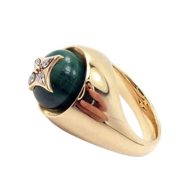 18k Yellow Gold Diamond Malachite Monogram Blossom Signet Ring by Louis Vuitton. Includes Louis Vuitton Box Details: Ring...