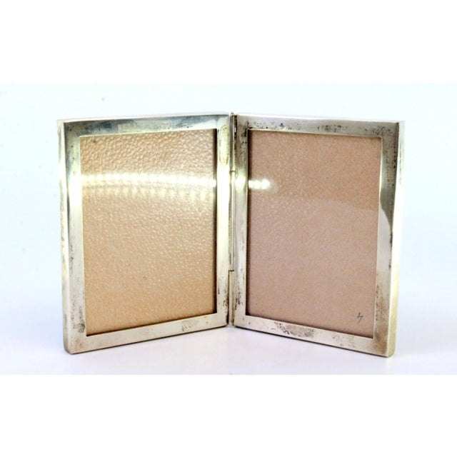 Double Frame in Silver Lined with Wood, in Very Good conditions. Designed 1920 to 1949 This piece has an attribution mark,...