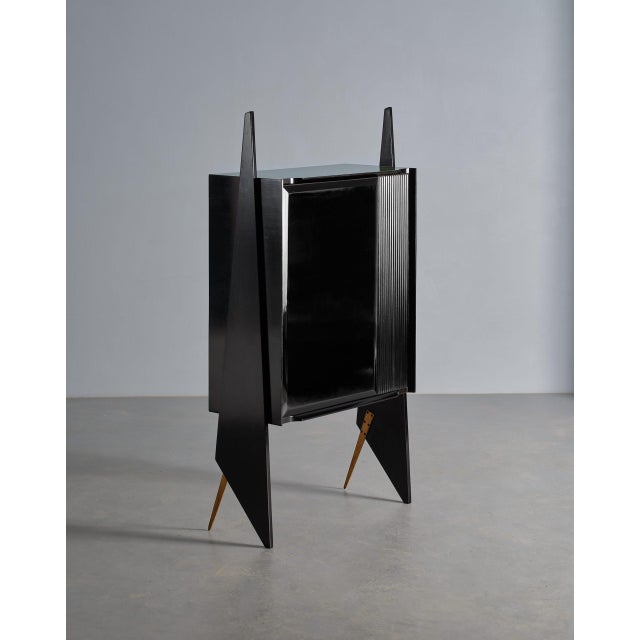 Presenting a masterfully restyled piece from the 1950s, this Italian credenza offers a dialogue between vintage charm and...