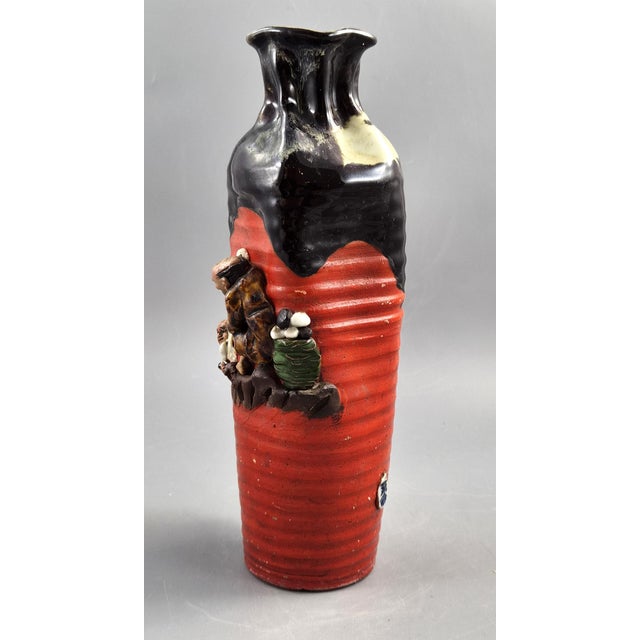 A hand-thrown Japanese Sumida Gawa (Sumida-yaki) vase by Inoue Ryōsai, of unusually tall and slender form, dating to the...