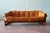 A solid jatoba and leather sling sofa by Percival Lafer for Brazil Industries circa 1970’s. This model MP-91 sofa is newly...