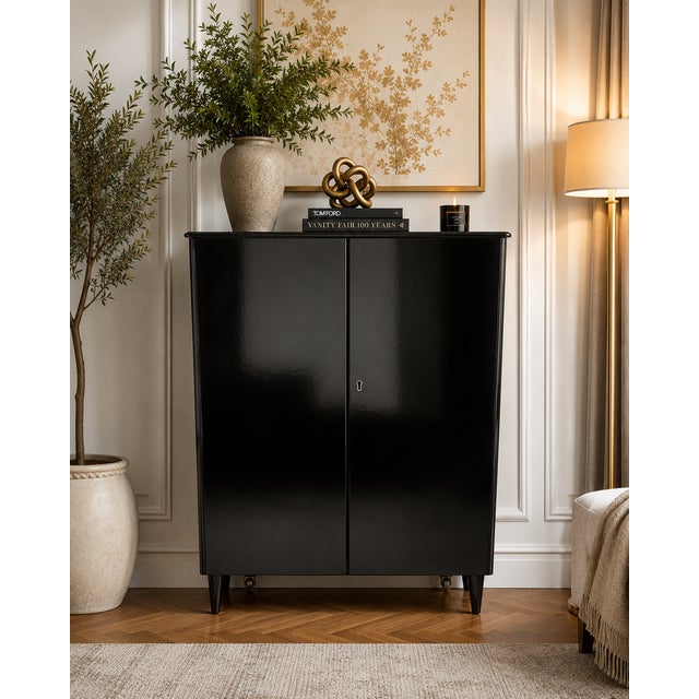 This striking vintage Scandinavian linen cabinet, attributed to Bodafors of Sweden, has been thoughtfully transformed into...