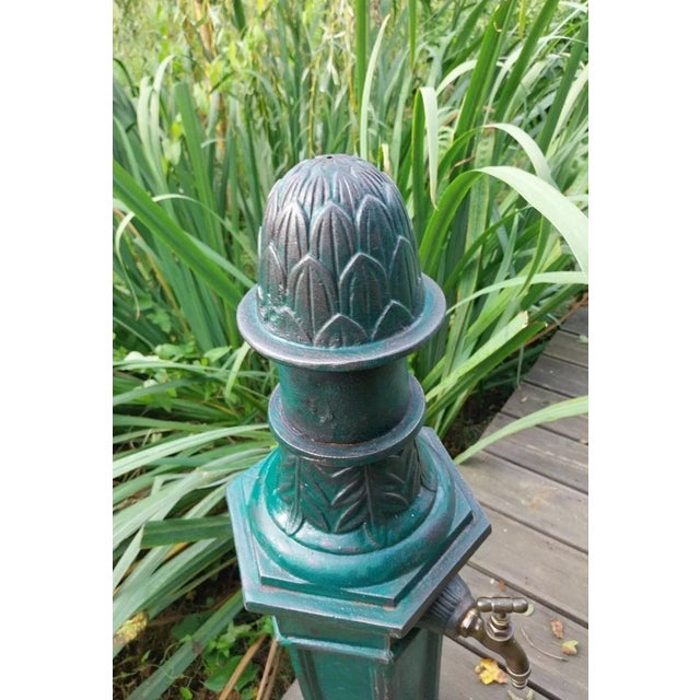 Antique cast iron park fountain, early 20th century, featuring an artichoke and a brass faucet. Highly decorative, it will...