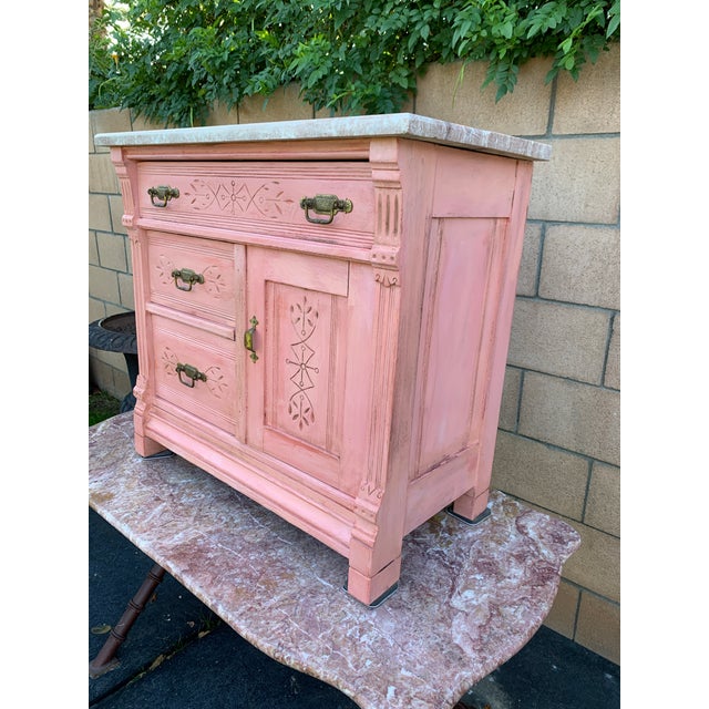 Here we have a darling antique Victorian Eastlake washstand or commode. Absolutely adorable oak chest in distressed pink...