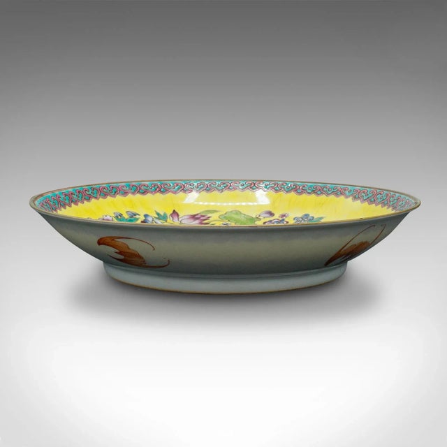 This is an antique Famille Jaune decorative dish. A Chinese, ceramic display plate, dating to the late Victorian period,...