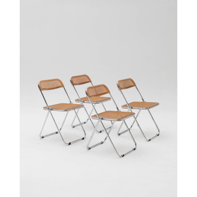 The iconic Plia folding chairs, designed by the renowned Italian designer Giancarlo Piretti for Castelli in the late...