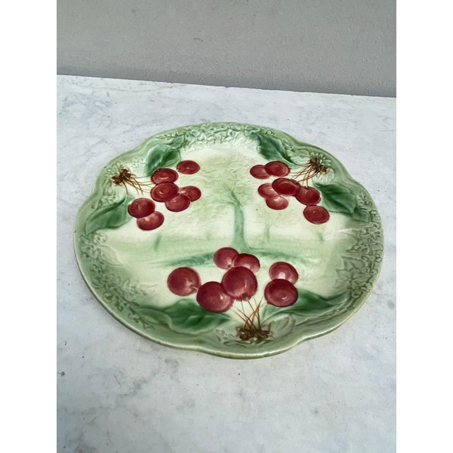 19th century Majolica Cherries Plate signed Choisy Le Roi. Made for Higgins & Setter New York. The Higgins & Seiter...