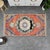 Welcome to our curated collection of authentic Anatolian textiles. This exquisite hand-knotted small rug brings a touch of...