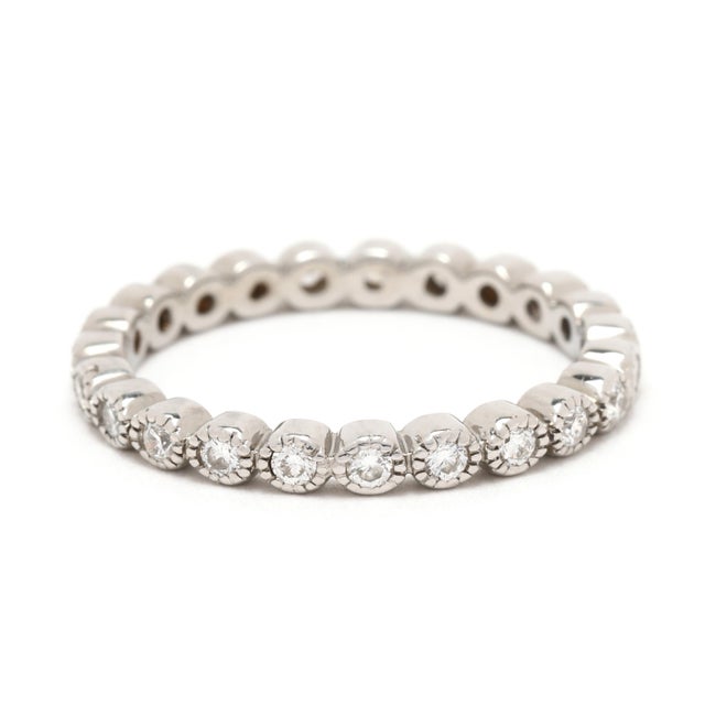 Stones: diamonds, 23 stones round brilliant cut 1.5 mm approximately .35 total carats G-H color, VS2-SI1 clarity Ring Size...