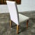 Andreu World chairs, made with a beech wood structure, with white fabric upholstery. Measurements: seat height 47cm, width...