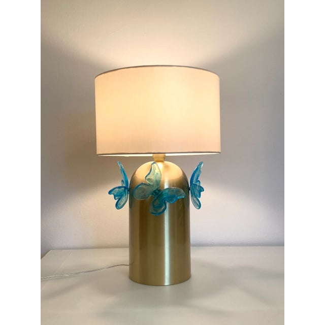 Contemporary Light-Blue Butterfly Murano Glass Table Lamp. Totally brass brushed and glow painted for this impressive...