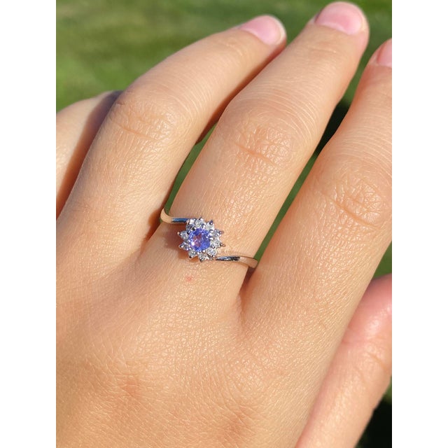 The Laidlaw: Laies 14K White Gold Ring set with Tanzanite and Diamonds. Crafted in 14 karat white gold, this ladies' ring...