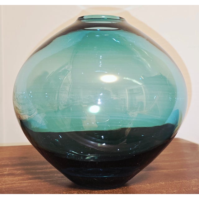A beautifully crafted contemporary studio glass vase, hand‑blown by an independent glassmaker and finished in a striking...