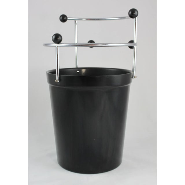 This umbrella holder was designed around the 1930s in the Streamline Moderne style of Art Deco. It remains in a good...