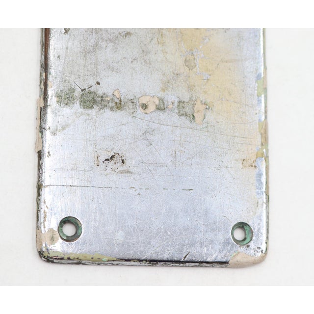 Classic style brass push plate with a nickel finish. Made by Yale & Towne. The original mounting screws are not available....