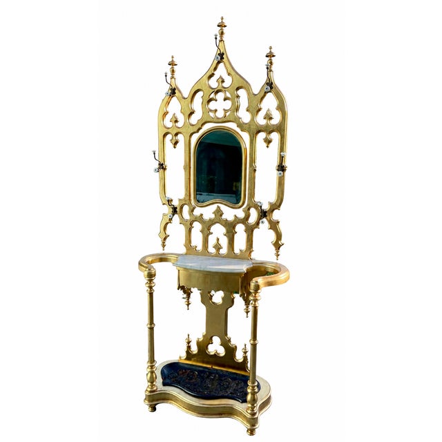 An exceptional Gothic Revival hall stand dating to the late 19th or early 20th century, showcasing dramatic architectural...