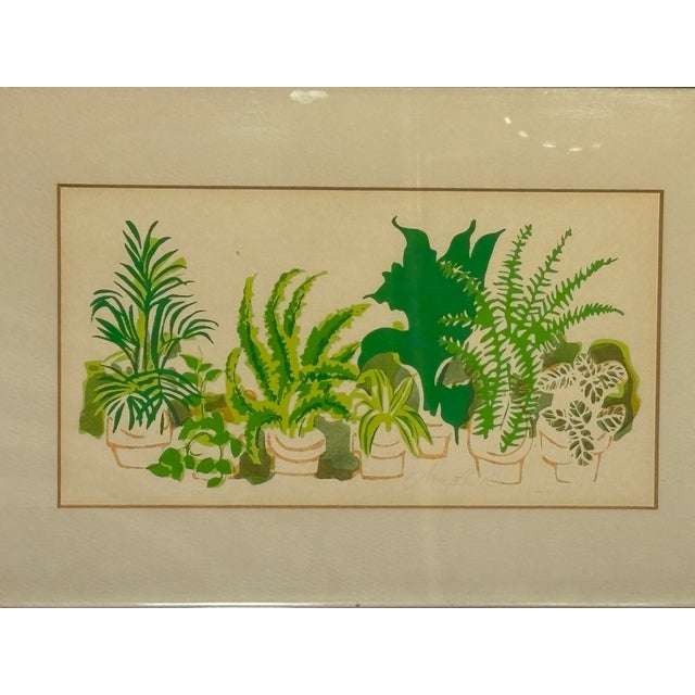 Vibrant vintage print in bold greens in a graphic almost silhouette-like style. Gives Milton Avery vibes with a nod to pop...