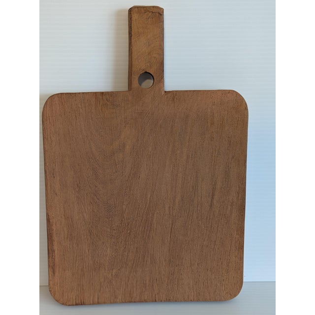 Vintage 1960s wood hand carved lion motif cutting board. Purchased by my grandparents in Zimbabwe, which was at the time...