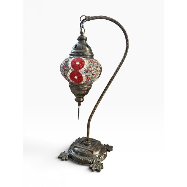 A striking Turkish mosaic glass table lamp with an exceptionally ornate sculptural base. This beautiful table lamp...