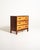 Art Deco chest of drawers with three large drawers, characterized by the contrast between the light birch fronts and the...