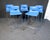Set of (5) sleek contemporary blue bar stools. These chairs feature contoured back rests, tall metal legs and foot rests....