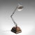 This is a vintage anglepoise lamp. An English, steel and aluminium desk or architect's light with bibliophile base, dating...