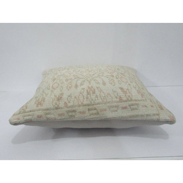 Decorative pillow cover made from a vintage Turkish handknotted rug. Backed with good quality cotton fabric. Pillow...