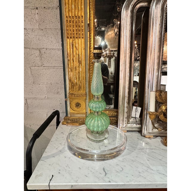 The Vintage Green Murano Lamp is a unique and collectible item that adds a touch of charm to any room. Made with high-...
