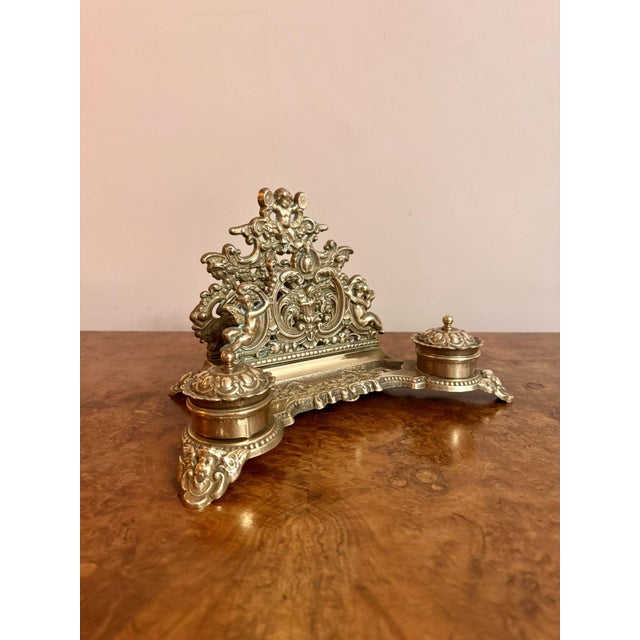 Quality antique Edwardian ornate brass desk set, having a quality ornate brass desk set, having a letter rack to the back,...