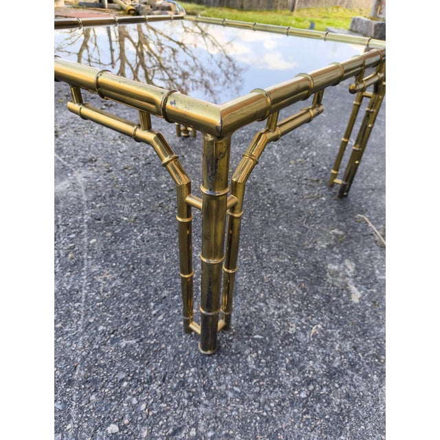 Beautiful decorative square coffee table with a bamboo-look finish and a smoked glass top, made in Italy in the 1970s. The...