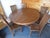 Nice vintage set of a large round teak table with 5 chairs by Chic Teak ready for use outdoor or indoor. Chic Teak still...