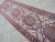 Antique Middle Eastern Heriz hand woven runner dating from the 1920s or 1930s with a striking Bakhshaish design on an...
