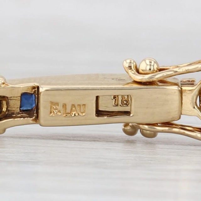 Gemstone Information: - Natural Sapphires - Total Carats - 2.40ctw Cut - Princess Color - Dark Blue Treatment - Heated -...