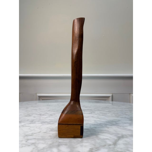 Striking mid-century modern biomorphic wood sculpture. Exquisitely handcrafted from rich solid walnut, this vintage piece...